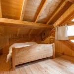 Camera matrimoniale della Baita Malga Fravort nel Lagorai