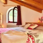 Camera matrimoniale dello Chalet Rustico Bertolini a Vermiglio